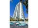 Condo pool with waterfall features and an adjacent high-rise at 322 Karen Ave # 1101, Las Vegas, NV 89109