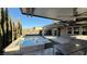 Backyard oasis with a pool, spa, and covered patio at 3498 Monte Cervino Ave, Henderson, NV 89044