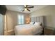 Bright bedroom with a comfortable bed and plenty of natural light at 3498 Monte Cervino Ave, Henderson, NV 89044