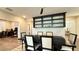 Bright dining room with built-in shelving and views into office at 3498 Monte Cervino Ave, Henderson, NV 89044