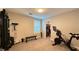 Home gym with stationary bike and other exercise equipment at 3498 Monte Cervino Ave, Henderson, NV 89044