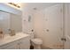 Clean bathroom with white vanity, new toilet and fixtures at 3561 Arville St # 801B, Las Vegas, NV 89103