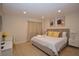 Main bedroom with a king-size bed and stylish decor at 3561 Arville St # 801B, Las Vegas, NV 89103