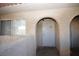 Private entrance to a condo unit with an arched doorway at 3561 Arville St # 801B, Las Vegas, NV 89103