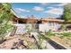 Backyard view showcasing a fence, block wall, and some greenery at 3826 S Torrey Pines Dr, Las Vegas, NV 89103