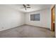 Simple bedroom with carpet flooring and a window at 3883 Steinbeck Dr, Las Vegas, NV 89115