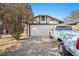 House exterior featuring a single-car garage and a driveway at 3883 Steinbeck Dr, Las Vegas, NV 89115