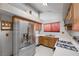 Kitchen with stainless steel appliances and wood cabinets at 3883 Steinbeck Dr, Las Vegas, NV 89115