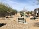 Community playground with benches and picnic tables offers outdoor enjoyment for residents at 4550 Kali Lyn St, North Las Vegas, NV 89031