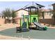 Vibrant community playground offers a slide and climbing area with a protective canopy for sunny days at 4550 Kali Lyn St, North Las Vegas, NV 89031