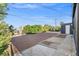 Large backyard with gravel, concrete patio, and landscaping at 465 Federal St, Henderson, NV 89015