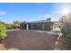 Backyard with gravel and a detached storage shed at 465 Federal St, Henderson, NV 89015