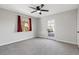 Bedroom with window, ceiling fan, and door leading outside at 465 Federal St, Henderson, NV 89015