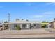 Gray single-story house with a carport and small front yard at 465 Federal St, Henderson, NV 89015