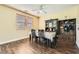 Cozy dining area featuring wood floors, dining table, and stylish decor at 5329 Fireside Ranch Ave, Las Vegas, NV 89131