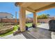 A covered patio opens to the backyard, creating a serene outdoor living space at 5329 Fireside Ranch Ave, Las Vegas, NV 89131