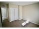 Cozy bedroom with closet space, neutral carpet, and soft natural light perfect for relaxation at 5732 Heron Ave, Las Vegas, NV 89107