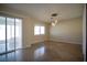 Bright dining area enhanced by sliding doors and a modern pendant light fixture at 5732 Heron Ave, Las Vegas, NV 89107