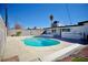 Sparkling private pool set in a backyard with clear blue sky above, great for entertaining or relaxation at 5732 Heron Ave, Las Vegas, NV 89107