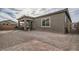 Spacious backyard featuring a covered patio, perfect for outdoor entertaining and relaxation at 6016 La Coste St, North Las Vegas, NV 89081