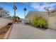 Spacious backyard featuring a convenient storage shed and producing lemon tree and ample room to entertain at 6105 Port Of Dreams Dr, Las Vegas, NV 89130