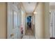 Hallway featuring neutral colors with doorways leading to other rooms at 6105 Port Of Dreams Dr, Las Vegas, NV 89130