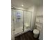 Bathroom featuring a step-in shower with white subway tile and a built-in bench at 6154 Rathbone St, Las Vegas, NV 89166