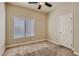 Cozy bedroom with neutral walls, carpet flooring, and a window for natural light at 6250 Sierra Knolls Ct, Las Vegas, NV 89139