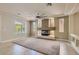 Spacious living room showcasing a sleek fireplace and large windows at 6250 Sierra Knolls Ct, Las Vegas, NV 89139