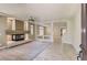 Open-concept living room featuring a modern fireplace and neutral decor at 6250 Sierra Knolls Ct, Las Vegas, NV 89139