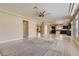 Spacious living room with an open layout, connecting to the kitchen and dining areas at 6250 Sierra Knolls Ct, Las Vegas, NV 89139