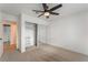 Bedroom with mirrored closet doors and neutral carpeting at 6885 Stone Dr, Las Vegas, NV 89110