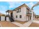 Modern two-story home with a two-car garage and walkway at 6885 Stone Dr, Las Vegas, NV 89110