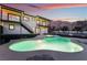 Luxury two-story home with a large pool and spa, mountain view at 6885 Stone Dr, Las Vegas, NV 89110