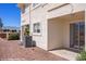 Backyard patio featuring rock landscaping, air conditioning unit and slider at 700 Aztec Cir # 2E, Mesquite, NV 89027