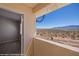 Balcony view from an apartment room overlooking the desert landscape at 700 Aztec Cir # 2E, Mesquite, NV 89027