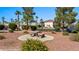 Picturesque common area with seating and desert landscaping, creating a serene and inviting space for residents to enjoy at 700 Aztec Cir # 2E, Mesquite, NV 89027