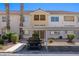 Inviting condo featuring covered parking, desert landscaping, and a neutral color palette at 700 Aztec Cir # 2E, Mesquite, NV 89027