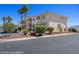 Exterior shot featuring well-maintained landscaping, multiple parking spaces and covered parking at 700 Aztec Cir # 2E, Mesquite, NV 89027