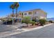 Exterior shot of multi-unit building featuring well-maintained landscaping, and covered parking at 700 Aztec Cir # 2E, Mesquite, NV 89027