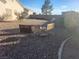 Gravel backyard featuring desert landscaping and a seating area, ready for outdoor enjoyment and relaxation at 7076 Oakleigh Dr, Las Vegas, NV 89110