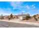 Nice single-story home with a three-car garage, desert landscaping, and portable storage on the driveway at 7076 Oakleigh Dr, Las Vegas, NV 89110