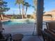 Backyard features an in-ground pool and spa with mountain views at 7076 Oakleigh Dr, Las Vegas, NV 89110