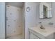 Bathroom with a shower, sink and mirror with tiled walls at 709 N 22Nd St, Las Vegas, NV 89101