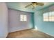 Bedroom with painted walls, carpet floors, and a ceiling fan with decorative lighting at 709 N 22Nd St, Las Vegas, NV 89101