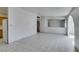 Open-concept room with tile flooring connecting to the kitchen at 709 N 22Nd St, Las Vegas, NV 89101