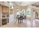 Cozy dining area with backyard views and adjacent coffee bar at 8875 Steven Chase Ct, Las Vegas, NV 89149