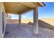 Covered back patio with brick pavers and stucco pillars, perfect for outdoor entertaining at 92 Starlight Sonata Ave, Henderson, NV 89015