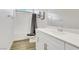 Clean bathroom featuring a single sink vanity, tile flooring, and a shower-tub combination at 92 Starlight Sonata Ave, Henderson, NV 89015