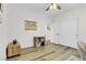 Cozy bedroom with wood-look flooring, ample closet space, and natural light at 92 Starlight Sonata Ave, Henderson, NV 89015